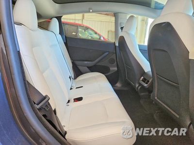 Zdjęcie 10 z 12 samochodu: 2023 TESLA MODEL Y VIN:7SAYGDEF8PF897330 - miniatura