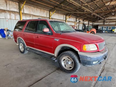 Czwarte zdjęcie samochodu z boku: 1999 FORD EXPEDITION VIN:1FMPU18L4XLB09962 - miniatura
