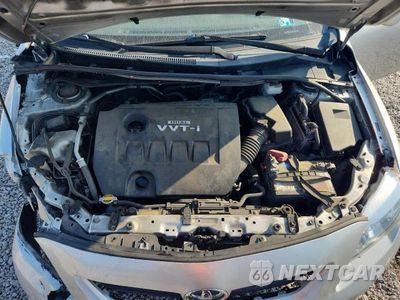 Zdjęcie 11 z 12 samochodu: 2009 TOYOTA COROLLA LE VIN:JTDBL40E399065050 - miniatura
