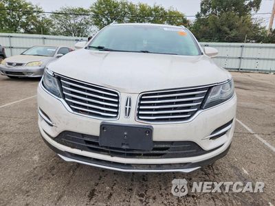 Piąte zdjęcie samochodu w środku: 2018 LINCOLN MKC PREMIERE VIN:5LMCJ1D95JUL22757 - miniatura