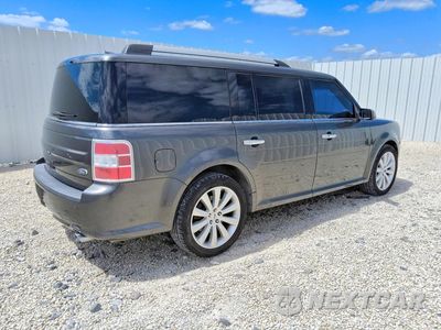 Trzecie zdjęcie samochodu z tyłu: 2016 FORD FLEX SEL VIN:2FMGK5C82GBA21606 - miniatura