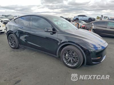 Czwarte zdjęcie samochodu z boku: 2024 TESLA MODEL Y VIN:7SAYGAEE2RF184321 - miniatura