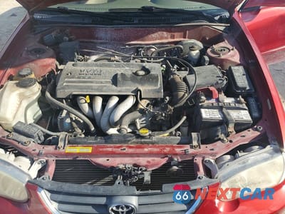 Zdjęcie 11 z 12 samochodu: 2001 TOYOTA COROLLA LE VIN:2T1BR12E41C449346 - miniatura