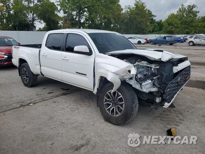 Czwarte zdjęcie samochodu z boku: 2021 TOYOTA TACOMA TRD SPORT VIN:3TMDZ5BN0MM107663 - miniatura