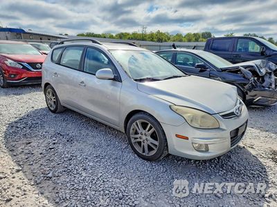 Czwarte zdjęcie samochodu z boku: 2010 HYUNDAI ELANTRA TOURING SE VIN:KMHDC8AEXAU061170 - miniatura