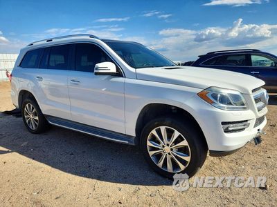 Czwarte zdjęcie samochodu z boku: 2015 MERCEDES-BENZ GL 450 4MATIC VIN:4JGDF6EE1FA446499 - miniatura