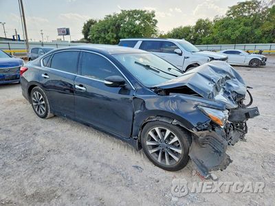 Czwarte zdjęcie samochodu z boku: 2017 NISSAN ALTIMA 2.5 SL VIN:1N4AL3AP4HC123714 - miniatura