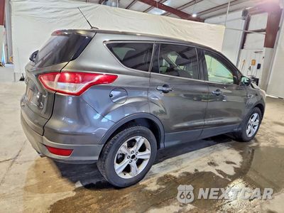 Trzecie zdjęcie samochodu z tyłu: 2016 FORD ESCAPE SE VIN:1FMCU0G77GUA88340 - miniatura