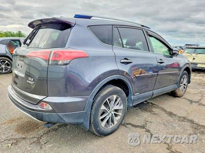 Trzecie zdjęcie samochodu z tyłu: 2017 TOYOTA RAV4 HYBRID XLE VIN:JTMRJREV1HD144559 - miniatura