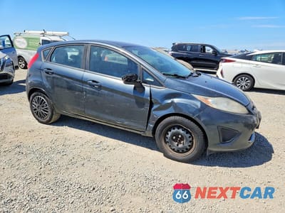 Czwarte zdjęcie samochodu z boku: 2011 FORD FIESTA SE VIN:3FADP4EJ4BM189618 - miniatura