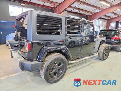 Trzecie zdjęcie samochodu z tyłu: 2012 JEEP WRANGLER UNLIMITED SAHARA VIN:1C4BJWEG9CL134538 - miniatura