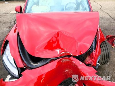 Zdjęcie 11 z 12 samochodu: 2022 TESLA MODEL Y VIN:7SAYGDEE7NF425379 - miniatura