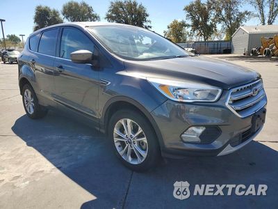 Czwarte zdjęcie samochodu z boku: 2017 FORD ESCAPE SE VIN:1FMCU9G95HUB08382 - miniatura