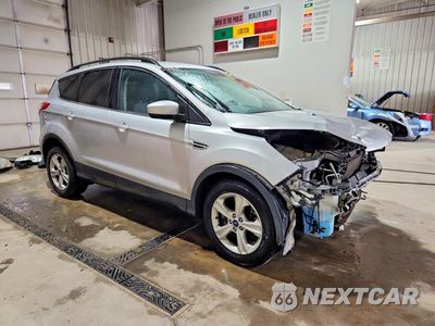 Czwarte zdjęcie samochodu z boku: 2016 FORD ESCAPE SE VIN:1FMCU9G97GUB10987 - miniatura