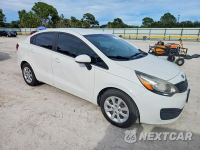 Czwarte zdjęcie samochodu z boku: 2014 KIA RIO LX VIN:KNADM4A32E6360670 - miniatura