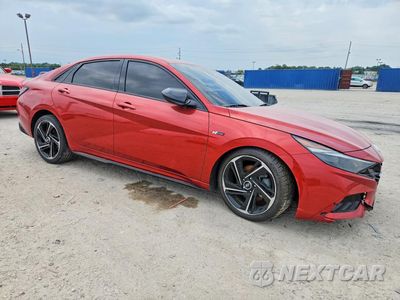 Czwarte zdjęcie samochodu z boku: 2022 HYUNDAI ELANTRA N LINE VIN:KMHLR4AF5NU231646 - miniatura