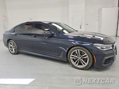 Czwarte zdjęcie samochodu z boku: 2019 BMW 750 XI VIN:WBA7F2C57KB240148 - miniatura