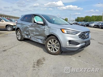 Czwarte zdjęcie samochodu z boku: 2022 FORD EDGE TITANIUM VIN:2FMPK4K97NBA55574 - miniatura