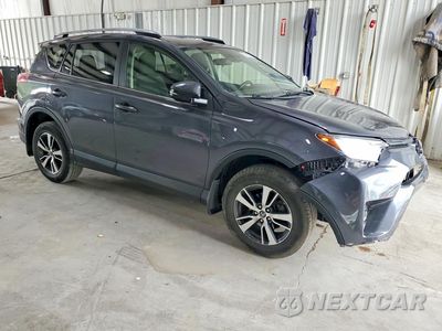 Czwarte zdjęcie samochodu z boku: 2018 TOYOTA RAV4 XLE VIN:JTMRFREV7JJ219421 - miniatura