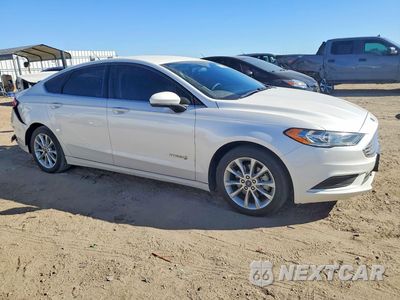 Czwarte zdjęcie samochodu z boku: 2017 FORD FUSION SE HYBRID VIN:3FA6P0LU2HR117388 - miniatura