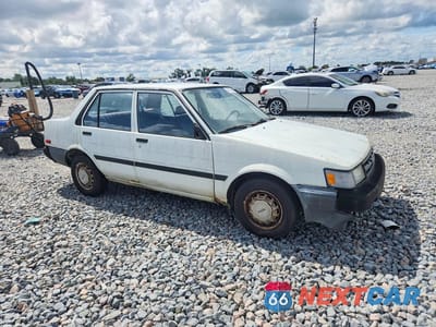 Czwarte zdjęcie samochodu z boku: 1987 TOYOTA COROLLA DELUXE VIN:JT2AE82E2H3542569 - miniatura
