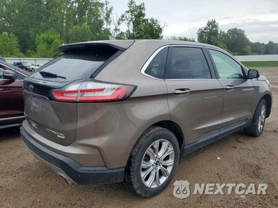 Trzecie zdjęcie samochodu z tyłu: 2019 FORD EDGE TITANIUM VIN:2FMPK4K90KBC37435 - miniatura