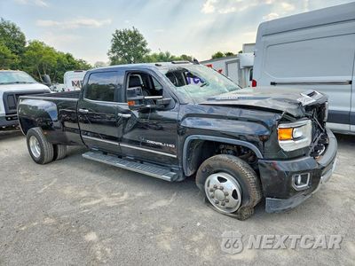 Czwarte zdjęcie samochodu z boku: 2019 GMC SIERRA K3500 DENALI VIN:1GT42WEY2KF235271 - miniatura