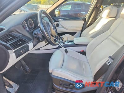 Zdjęcie 7 z 12 samochodu: 2011 BMW X5 M VIN:5YMGY0C59BLK26447 - miniatura