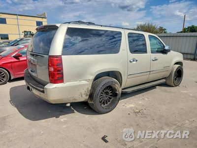 Trzecie zdjęcie samochodu z tyłu: 2014 CHEVROLET SUBURBAN C1500 LTZ VIN:1GNSCKE03ER111382 - miniatura