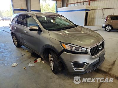 Czwarte zdjęcie samochodu z boku: 2016 KIA SORENTO LX V6 VIN:5XYPGDA59GG180062 - miniatura