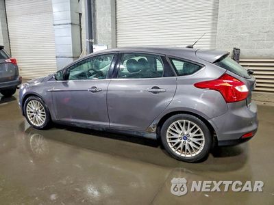 Drugie zdjęcie samochodu z przodu: 2014 FORD FOCUS TITANIUM VIN:1FADP3N24EL399192 - miniatura