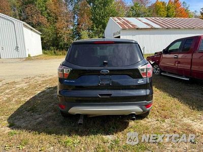 Czwarte zdjęcie samochodu z boku: 2017 FORD ESCAPE SE VIN:1FMCU9GD2HUA33113 - miniatura