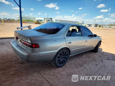 Trzecie zdjęcie samochodu z tyłu: 1999 TOYOTA CAMRY LE VIN:JT2BG28KXX0283841 - miniatura