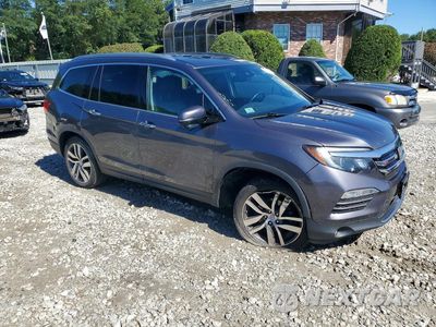 Czwarte zdjęcie samochodu z boku: 2016 HONDA PILOT TOURING VIN:5FNYF6H9XGB063285 - miniatura