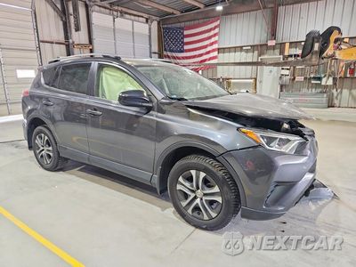 Czwarte zdjęcie samochodu z boku: 2017 TOYOTA RAV4 LE VIN:JTMBFREV7HJ150225 - miniatura
