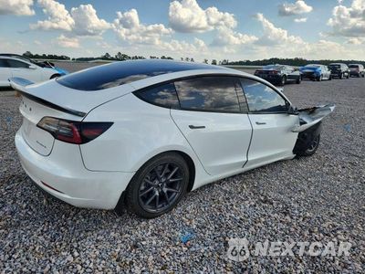 Trzecie zdjęcie samochodu z tyłu: 2023 TESLA MODEL 3 VIN:5YJ3E1EB3PF393616 - miniatura