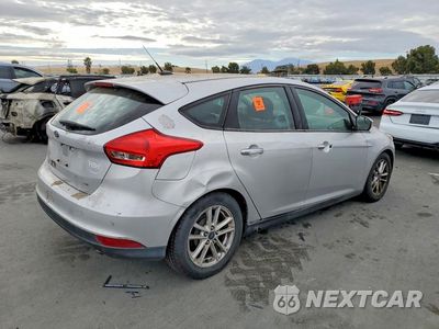 Trzecie zdjęcie samochodu z tyłu: 2016 FORD FOCUS SE VIN:1FADP3K26GL345321 - miniatura