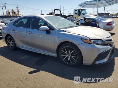 Czwarte zdjęcie samochodu z boku: 2024 TOYOTA CAMRY SE VIN:4T1G11AK1RU258501 - miniatura