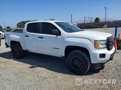 Czwarte zdjęcie samochodu z boku: 2016 GMC CANYON SLT VIN:1GTG6DE38G1248945 - miniatura