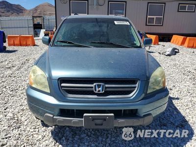 Piąte zdjęcie samochodu w środku: 2005 HONDA PILOT EXL VIN:2HKYF18535H559902 - miniatura