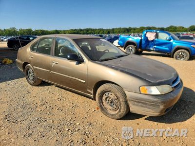 Czwarte zdjęcie samochodu z boku: 1999 NISSAN ALTIMA XE VIN:1N4DL01D4XC120019 - miniatura
