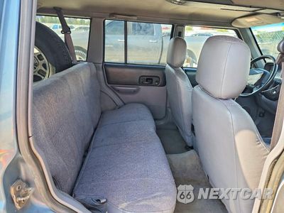 Zdjęcie 11 z 13 samochodu: 1998 JEEP CHEROKEE SPORT VIN:1J4FJ68S2WL179854 - miniatura