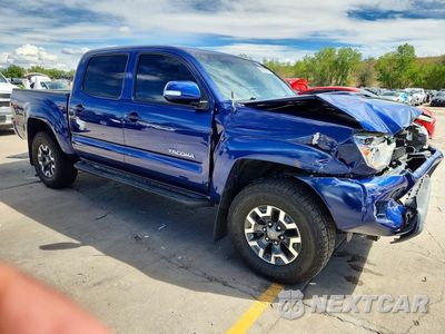 Czwarte zdjęcie samochodu z boku: 2014 TOYOTA TACOMA V6 VIN:3TMLU4EN4EM138903 - miniatura