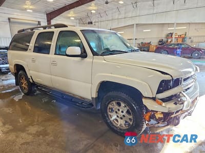 Czwarte zdjęcie samochodu z boku: 2002 CHEVROLET SUBURBAN K1500 VIN:3GNFK16Z42G249021 - miniatura
