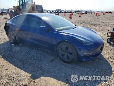Czwarte zdjęcie samochodu z boku: 2021 TESLA MODEL 3 VIN:5YJ3E1EA4MF093246 - miniatura