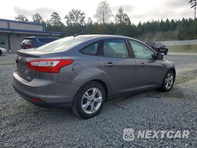 Trzecie zdjęcie samochodu z tyłu: 2014 FORD FOCUS SE VIN:1FADP3F21EL253220 - miniatura