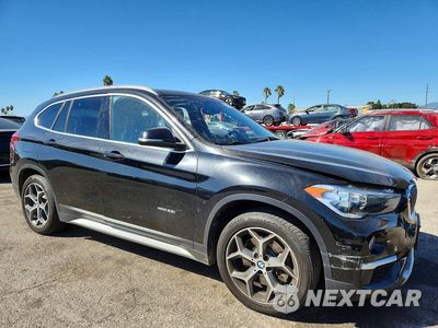 Czwarte zdjęcie samochodu z boku: 2018 BMW X1 XDRIVE28I VIN:WBXHT3C31J5K24662 - miniatura