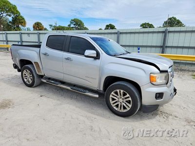 Czwarte zdjęcie samochodu z boku: 2017 GMC CANYON SLT VIN:1GTG5DEN9H1268160 - miniatura