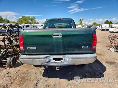 Zdjęcie 6 z 13 samochodu: 1999 FORD F250 SUPER DUTY VIN:1FTNX21F3XEB32196 - miniatura