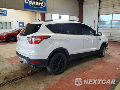 Trzecie zdjęcie samochodu z tyłu: 2018 FORD ESCAPE SE VIN:1FMCU9GDXJUC29807 - miniatura